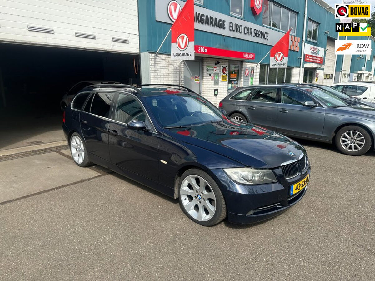 BMW 3 Serie Touring 330xi High Executive (IN PRIJS VERLAAGD) ZEER COMPLEET UITGEVEVOERD | Vakgarage